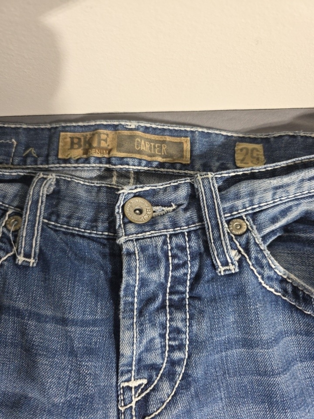 Buckle Slim Straight Jeans Button Fly in Distressed Blue Denim